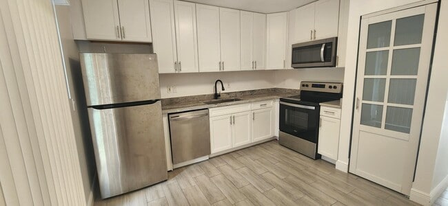 Building Photo - 9077 W Highland Pines Blvd