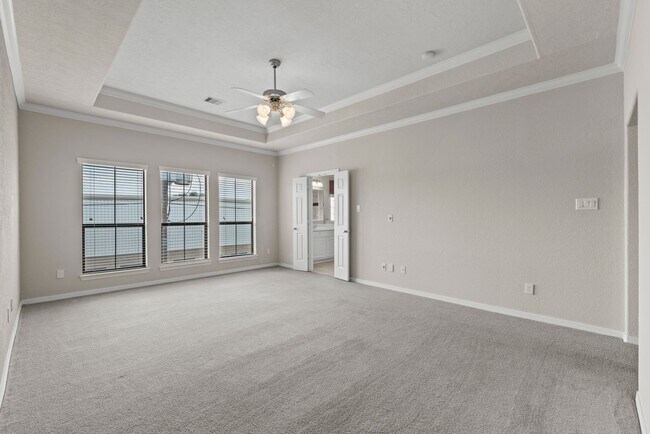 Building Photo - Luxury Townhome with Attached Garage & Outdoor Entertaining Area - $100 off first and second mont!