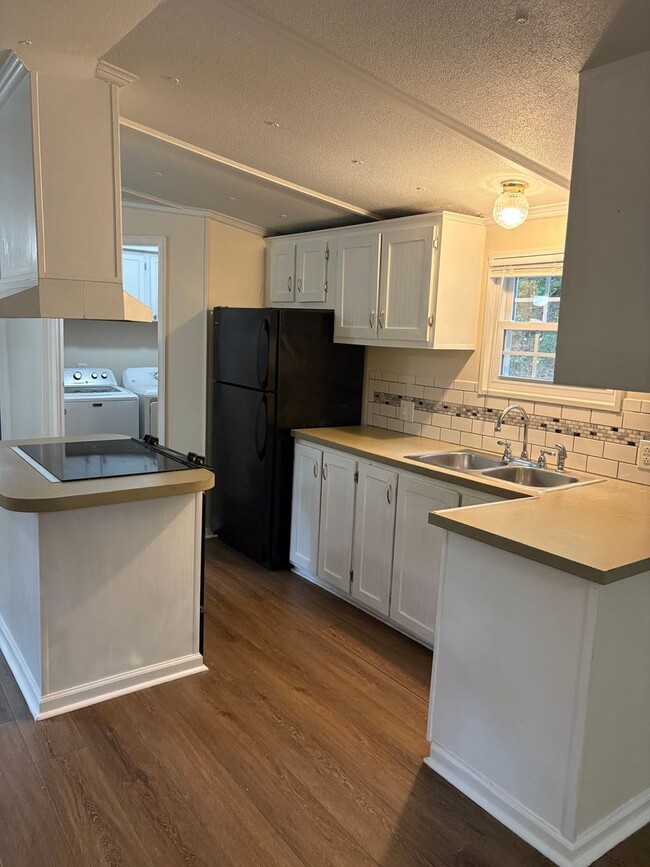 Building Photo - Secluded Open Floor Plan Mobile Home