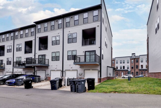 Building Photo - Three Story Brick End Unit with Rooftop Terrace