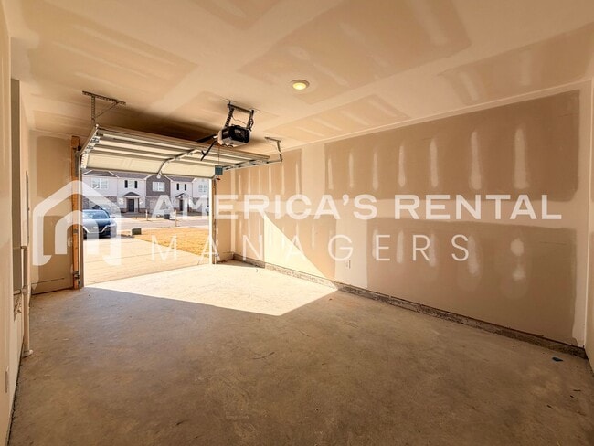 Building Photo - Spacious Two-Story Townhome with Open Layout!