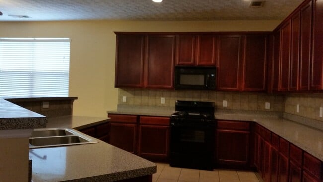 Building Photo - Swim Community - 4bd x 2 1/2bth w/2 Car Garage  (181 Bus Route) no sec 8