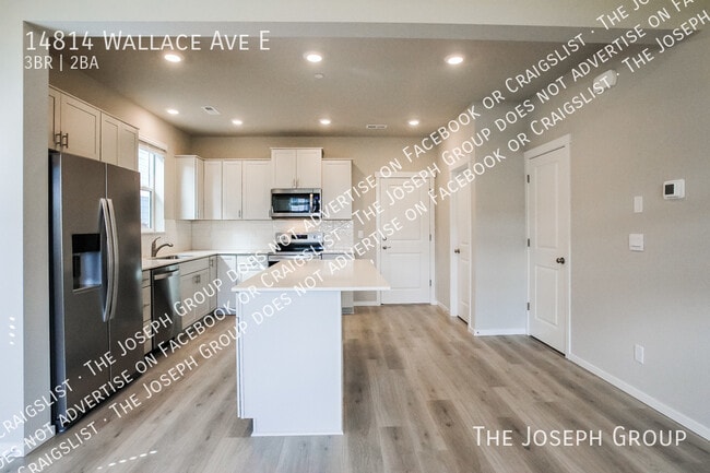 Building Photo - 14814 Wallace Ave E