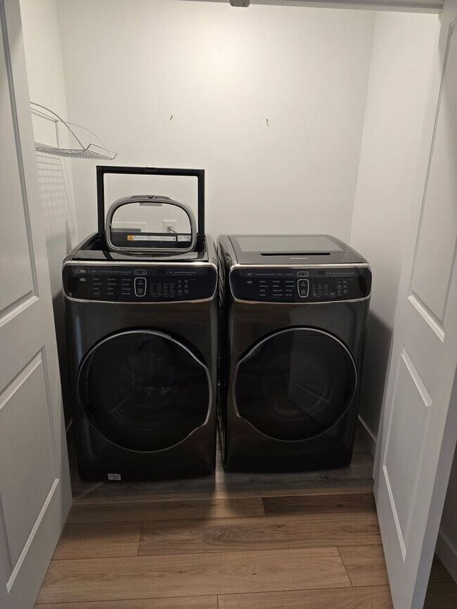 Building Photo - Nearly New, Well Appointed Modern Townhouse w 2 car attached garage