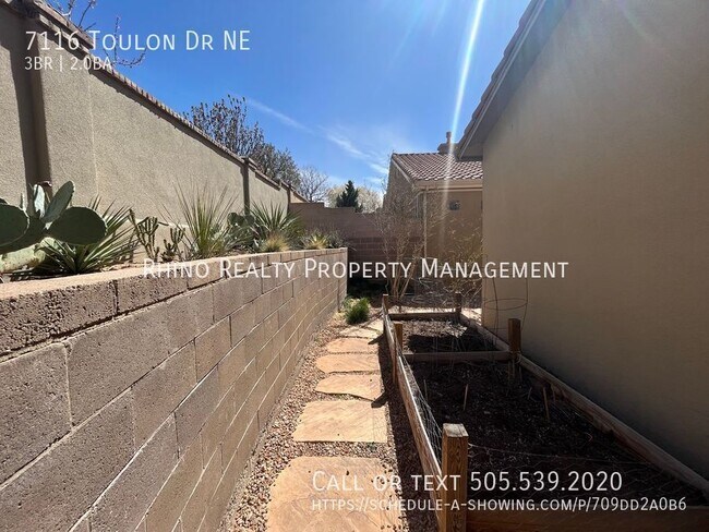 Building Photo - 7116 Toulon Dr NE