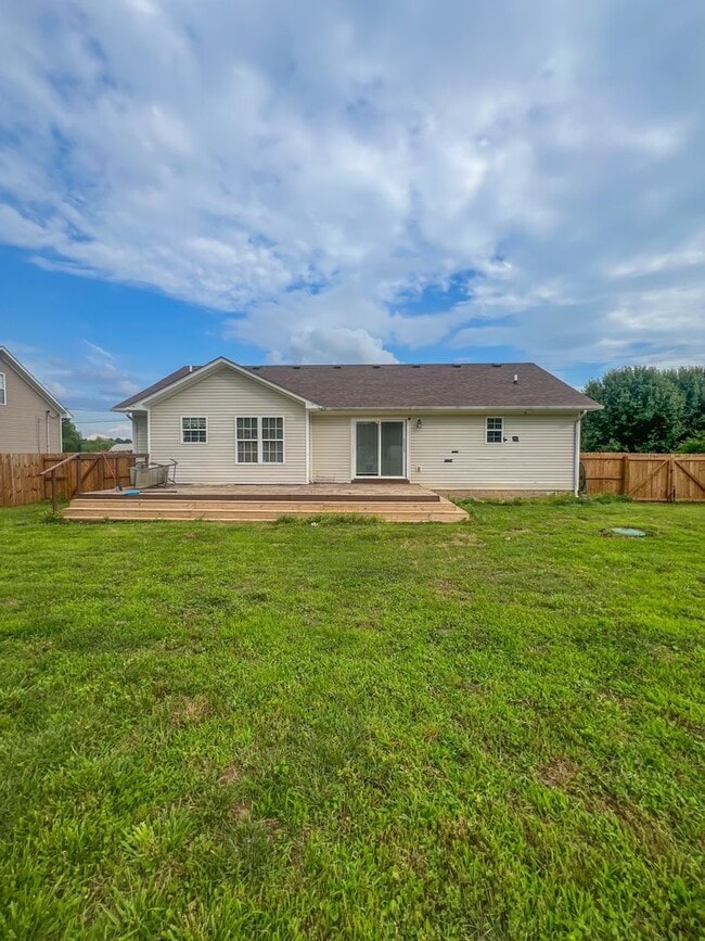 Building Photo - Massive Fenced Backyard with a Shed and Ga...