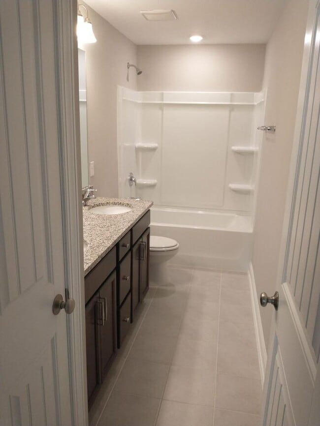 Building Photo - Just Listed in Benson, NC! Your dream home awaits — 4 bedrooms, tons of space, and gorgeous upgra...