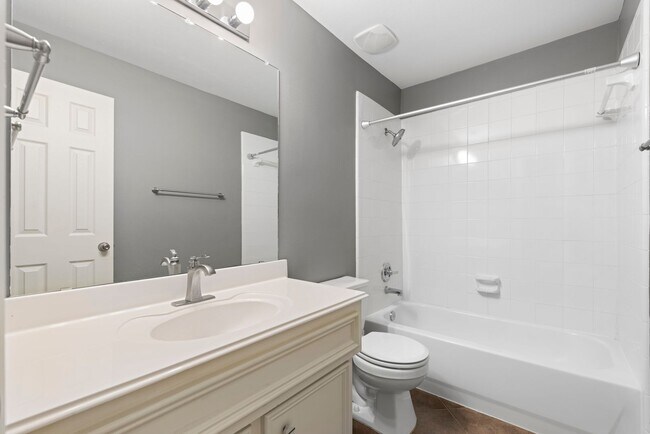Building Photo - Come see this modern 3-story townhome in t...