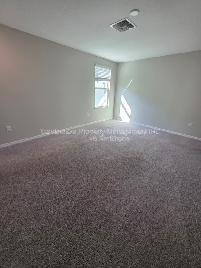 Building Photo - 7418 Rosy Periwinkle Ct