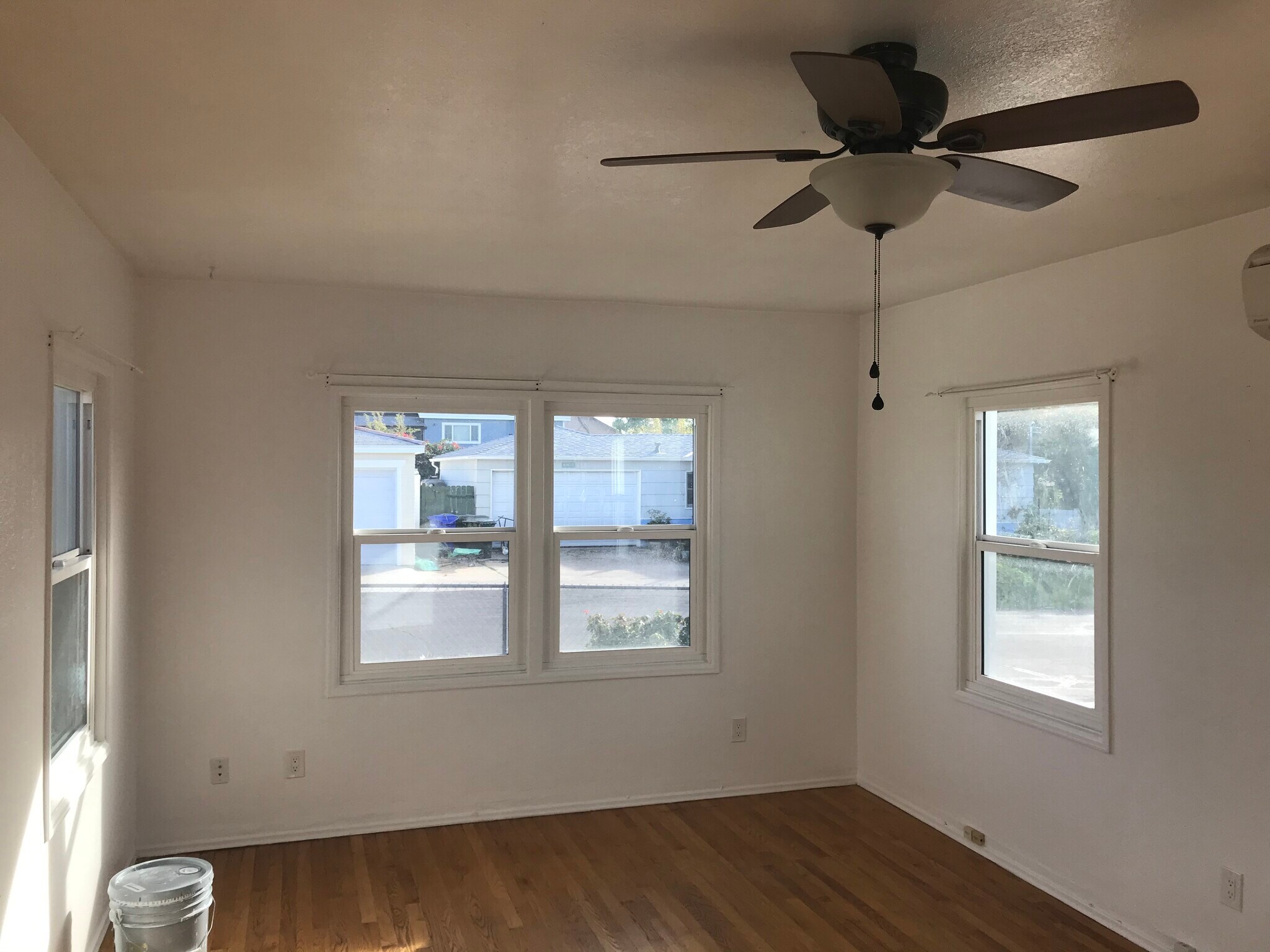Large living room with natural light - 6980 Adams Ave