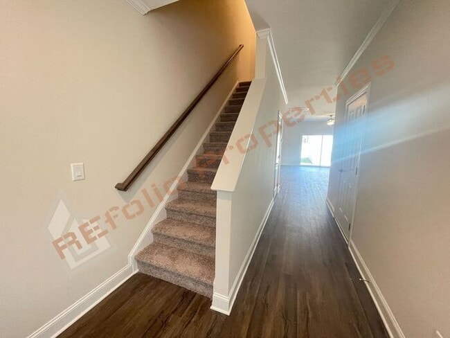 Building Photo - Brand New 3 Bedroom 1-Car Garage Townhome ...