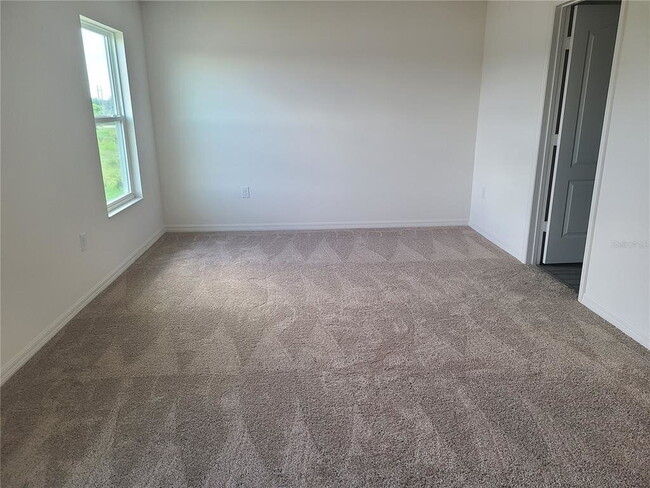 Building Photo - Beautiful 2-Bedroom Townhouse in Tampa | Brand New Paint & Vinyl Floors!