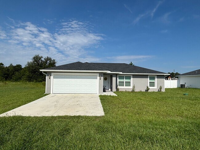 Building Photo - 2025 Newer House 3/2/2 fenced backyard. No carpet