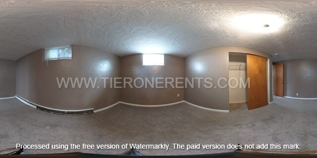 Building Photo - Charming and spacious basement unit priced...