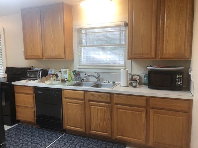 Kitchen (window looks out to trees and side yard) - 8528 SW 35th Ave