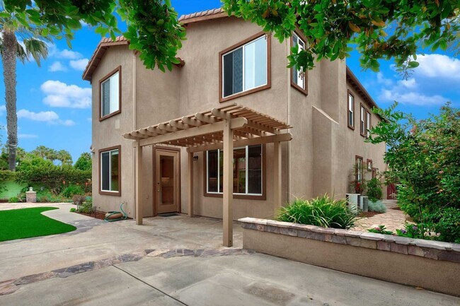 Building Photo - Gated corner lot home walking distance to the beach