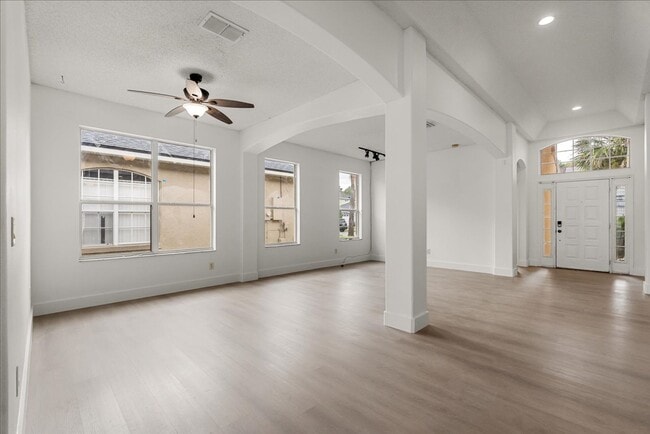 Building Photo - Stunning 4-Bedroom Lakefront Pool Home in Bridgeview at Meadow Woods