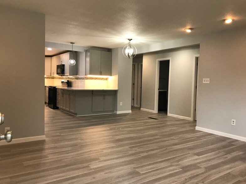 Open concept kitchen and living room - 1180 S Depew St