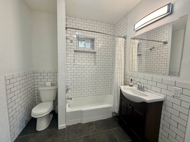 Building Photo - {2202 - A} Spacious Two Bedroom Condo in Historic Pendleton Heights Available Immediately
