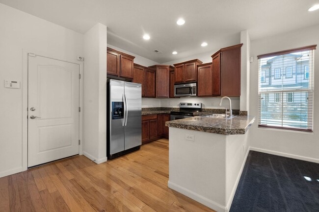 Building Photo - Beautiful 2 bdrm end unit with attach 2 car garage
