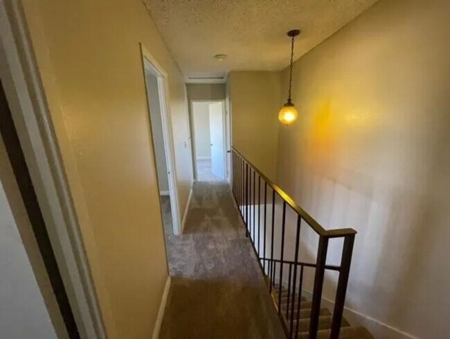 Building Photo - LOCATION & PRIVACY! Spacious 3 br Condo wi...