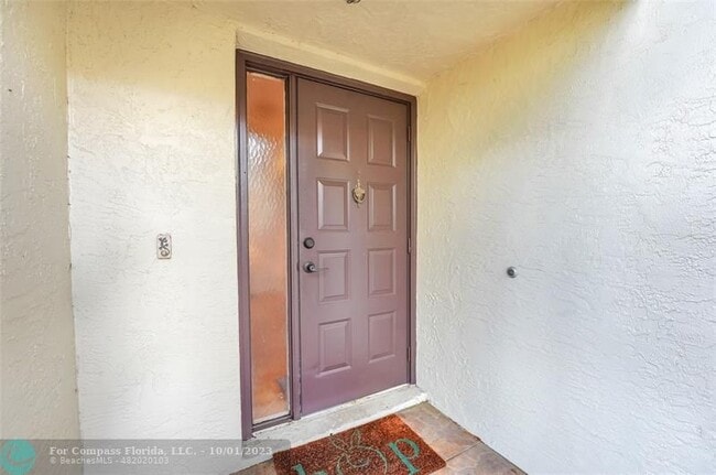 Building Photo - 3655 Cocoplum Cir
