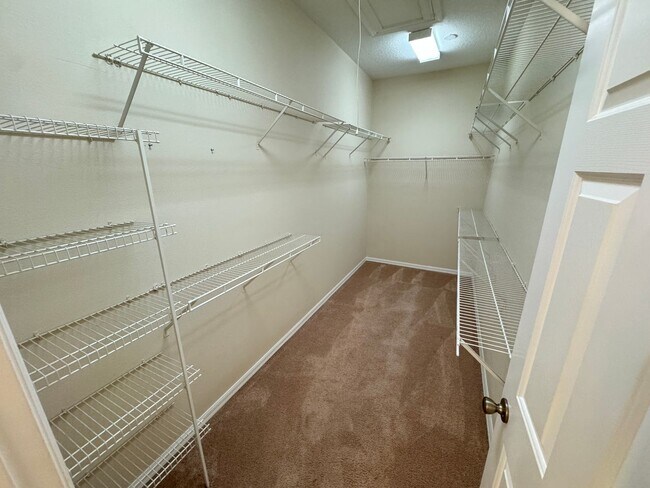 Building Photo - Spacious 4-Bedroom Home with Private Pool and Modern Comforts