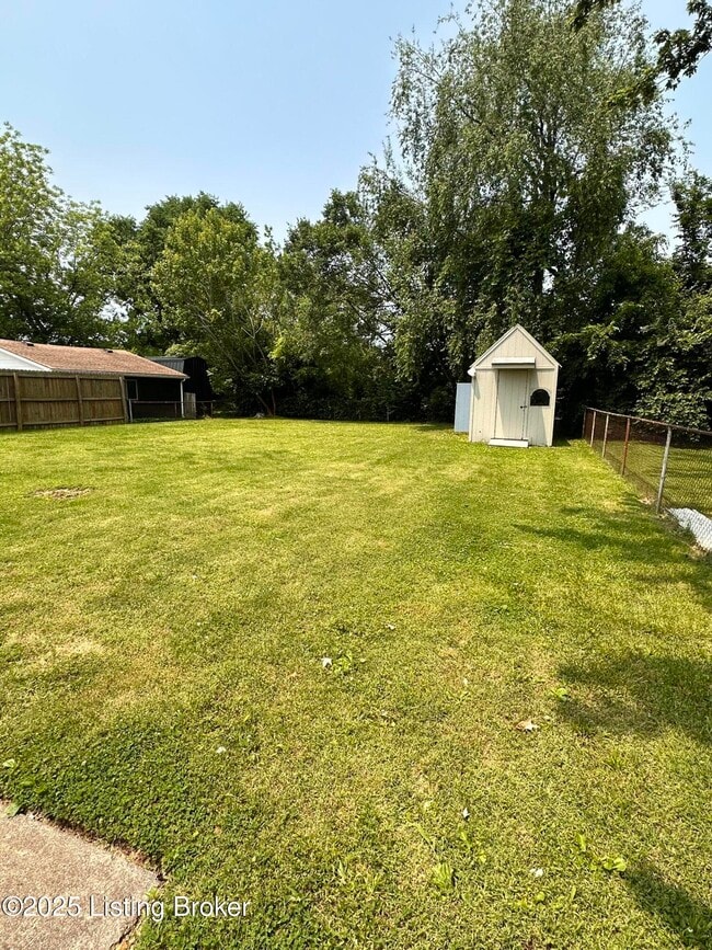 Building Photo - 9702 Harned Ave