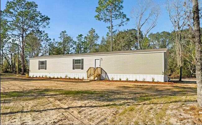 Building Photo - 5350 NE 108th Terrace