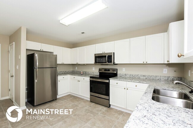 Building Photo - 7147 Wandering Creek Dr