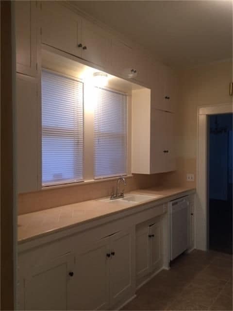 Kitchen cabinets, sink & window - 1200 Carlisle St