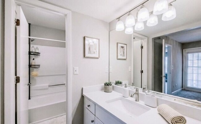 Building Photo - Spacious 2-Bedroom Elite Apartment with Private Balconies & Washer/Dryer