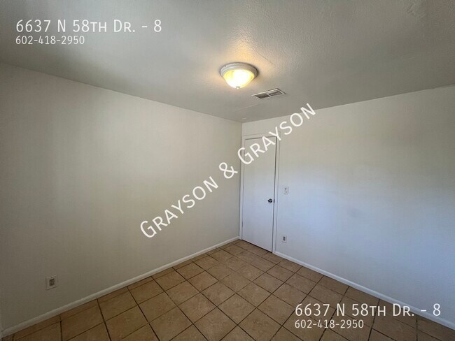 Building Photo - 6637 N 58th Dr