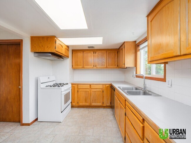 Building Photo - 3 Bedrooms | 1 Bathroom | 2,168 Sq. Ft. | Attached Garage | Large Yard