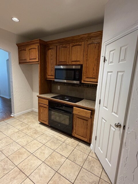 Building Photo - Former model home on corner lot is ready for move in!