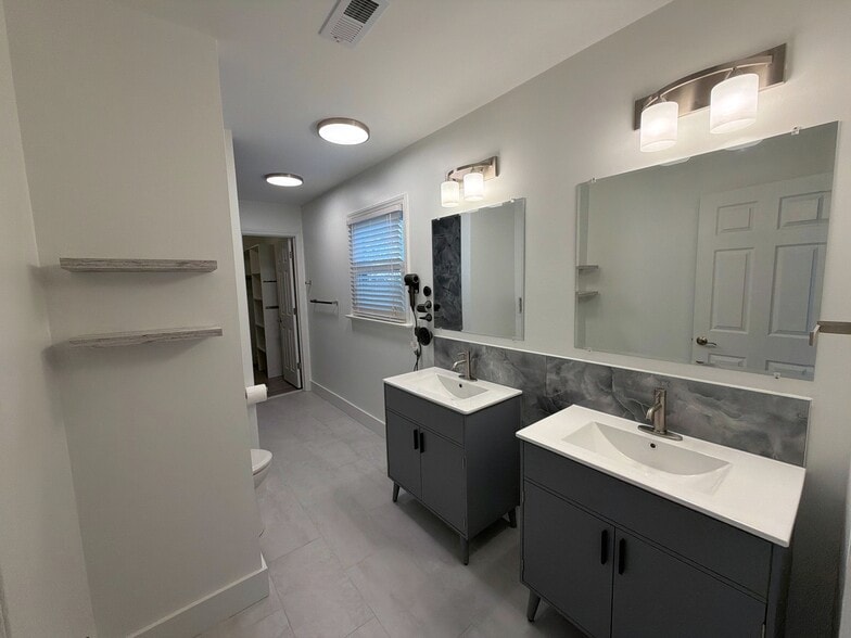 You'll love getting ready to go in the brand new, updated master bath. - 115 Waterfall Ct