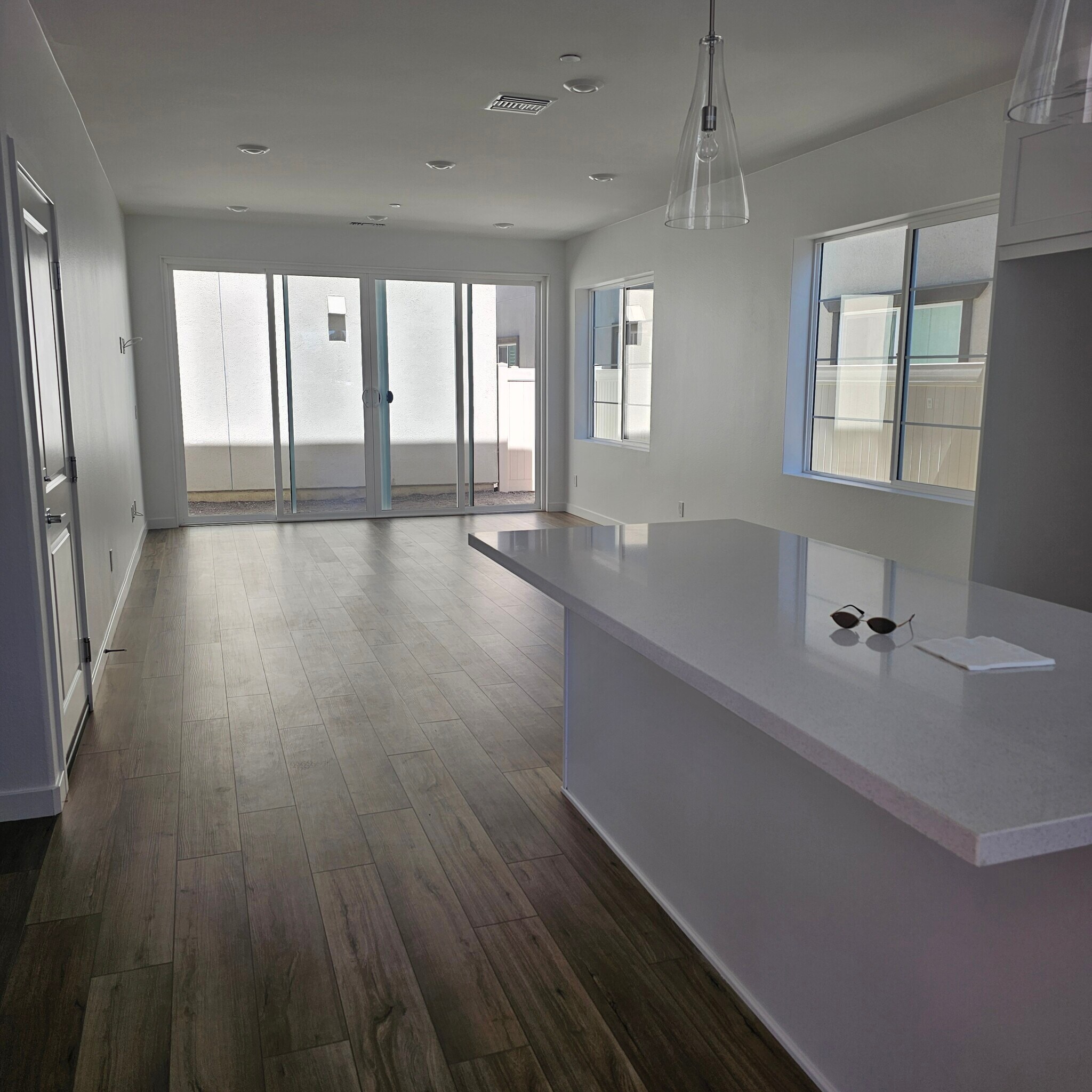 Living room with Quad Doors - 415 Willow Run Ln