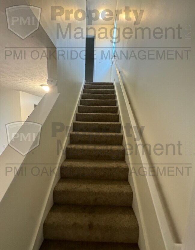 Building Photo - Two Bedroom Townhome with Attached Garage