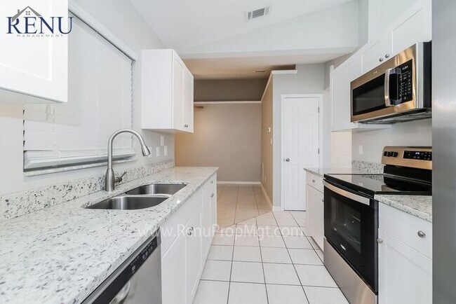 Building Photo - This Summer Special is Heating Up!: 50% of...