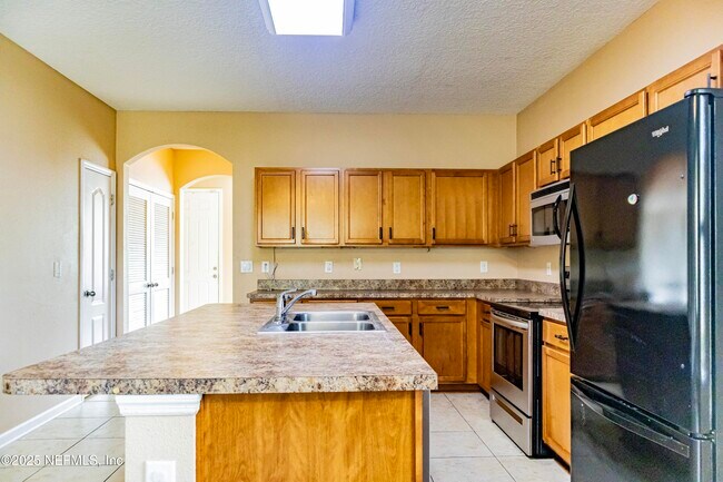 Building Photo - 4220 Plantation Oaks Blvd