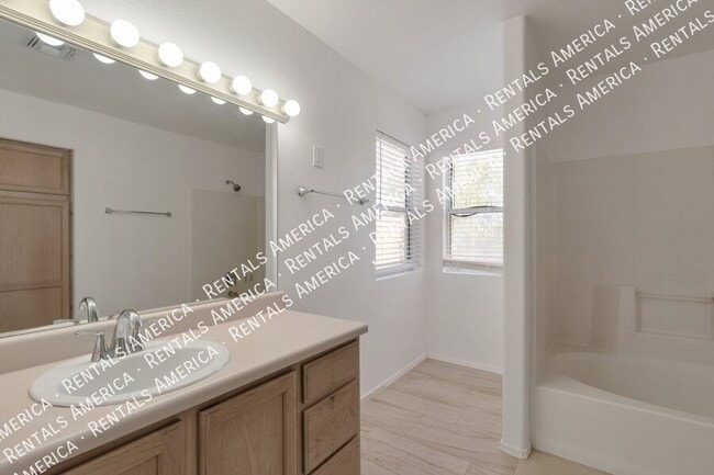 Building Photo - 5573 W Dove of Peace Dr