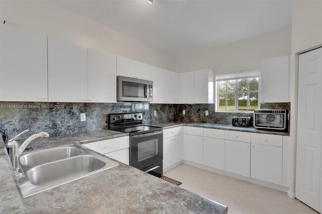 Building Photo - 9875 Galleon Dr