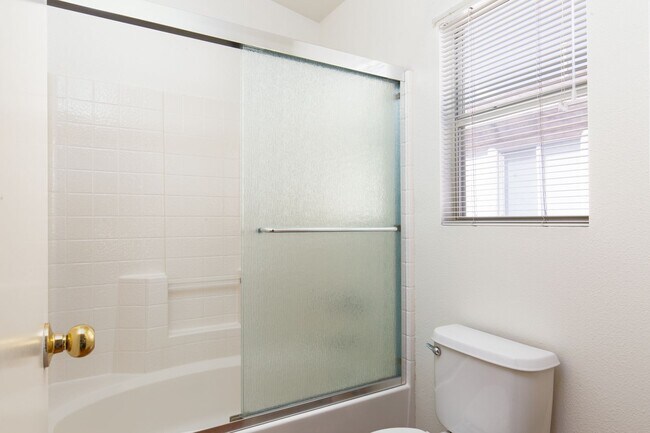 Building Photo - Two bedroom townhome with garage in gated ...