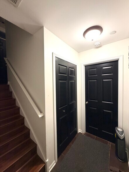 Closet on left and basement room door - 172 N East River Rd