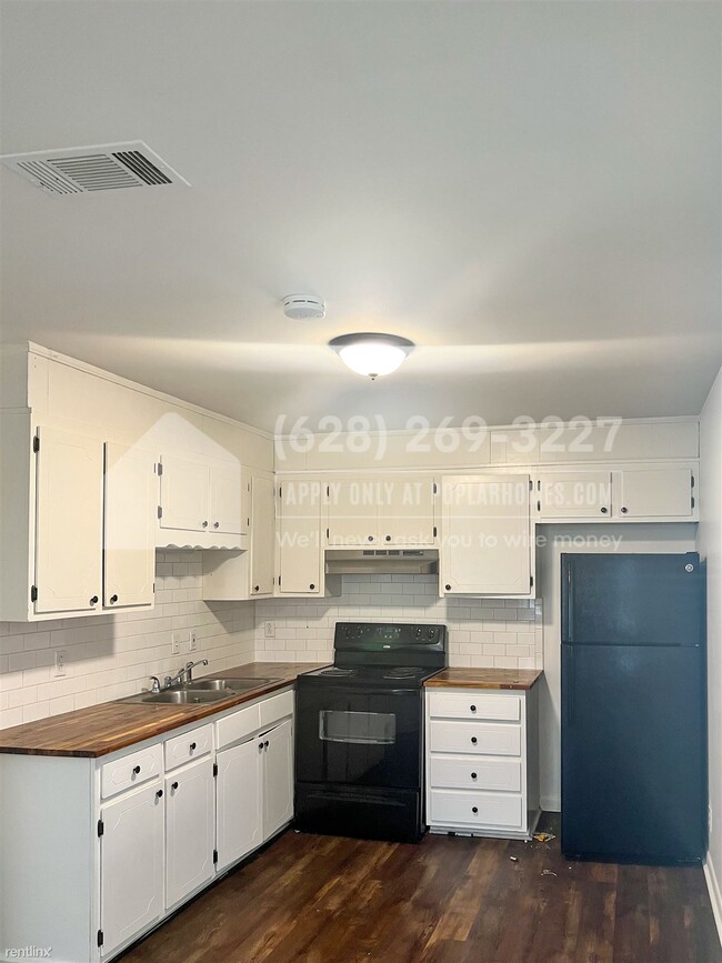 Building Photo - 2 br, 1 bath Duplex - 217 Queen Ave Unit B -