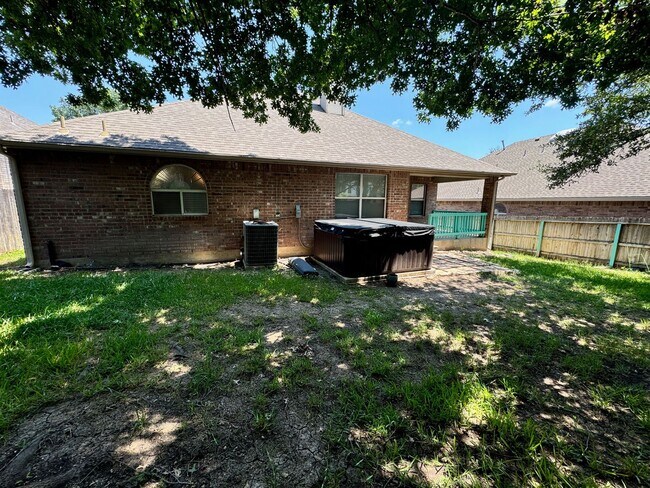 Building Photo - Ready For Move In! A Must See in Rogers Ranch - 4 Bedroom 2 Bath with Custom Features