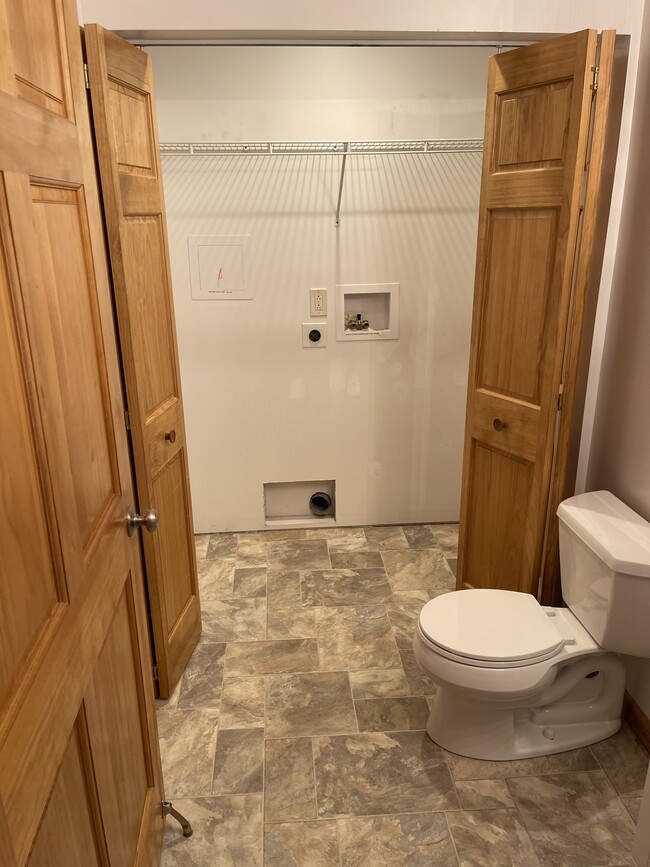 Laundry Room with hookups in half bath - 118 Willadine Dr