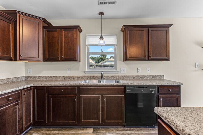 Building Photo - Spacious Home with Natural Light