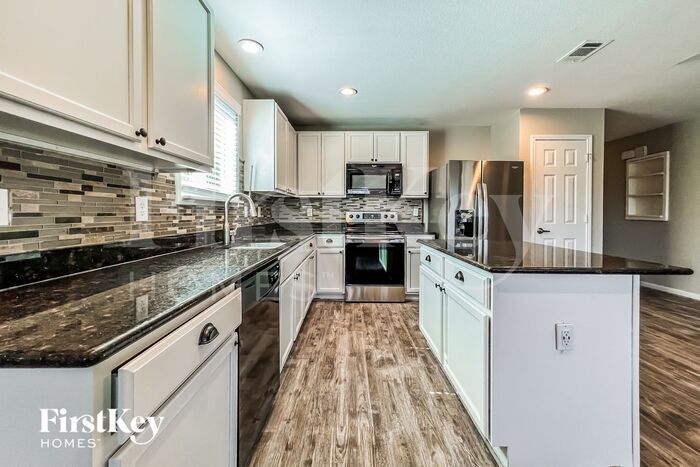 Building Photo - 128 Abelia Dr