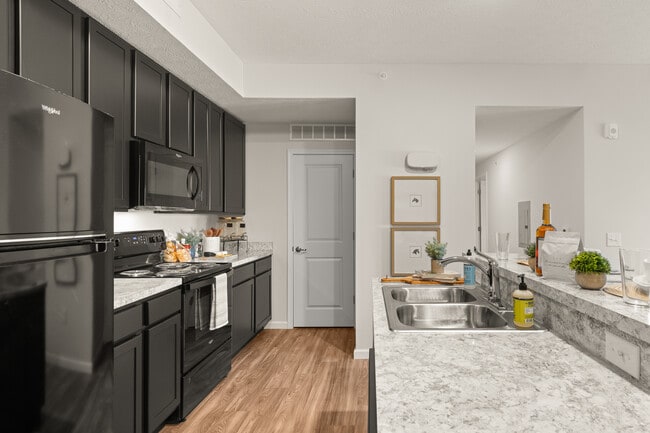Building Photo - The Residences at Golf Village